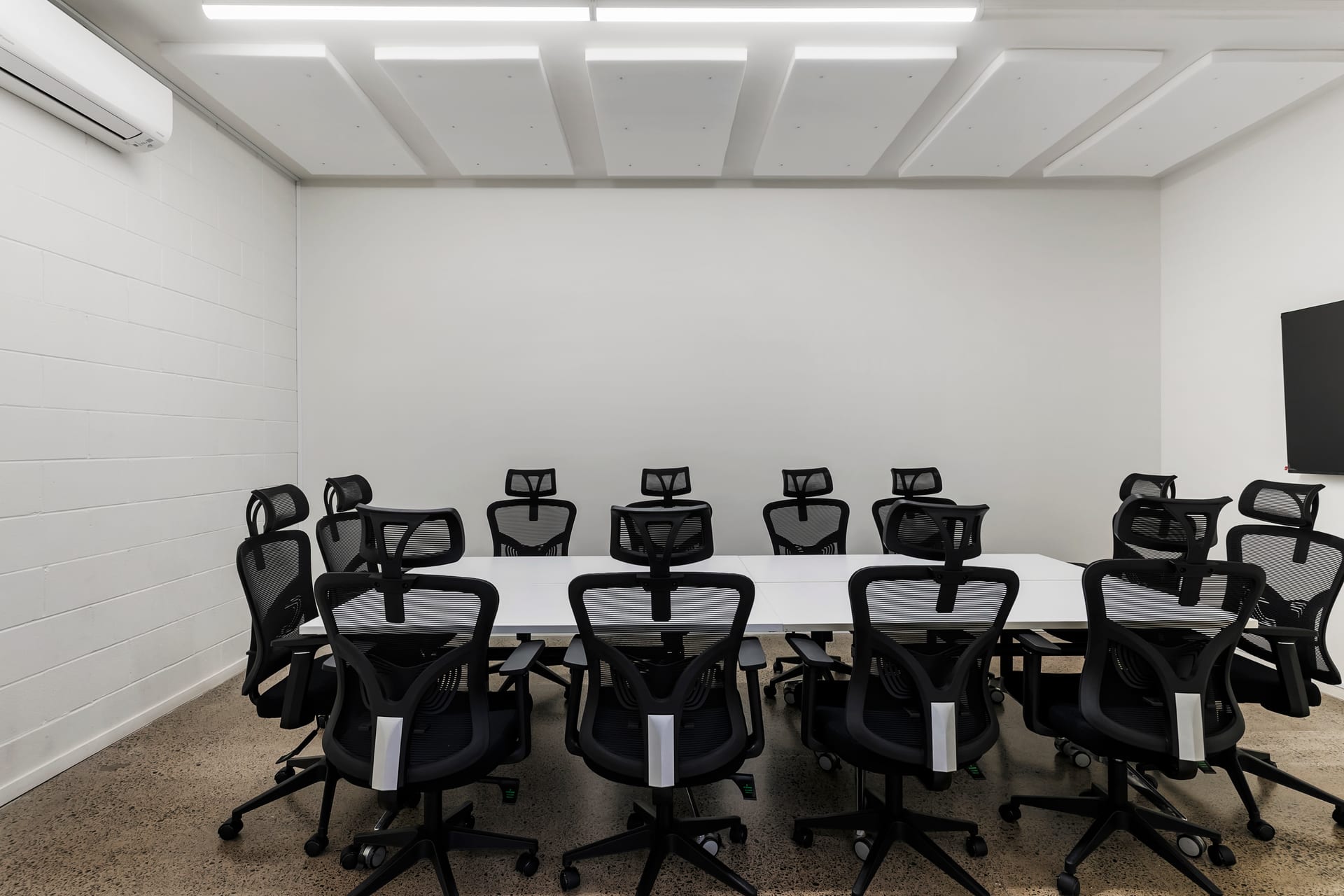 Long boardroom table with seating for a full team at Thinkspace Morningside